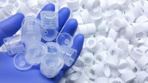 White,medical,plastic,bottle,caps.,made,from,injection,molding,machine,