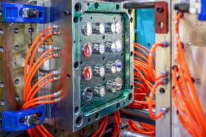 Close up,of,an,industrial,plastic,injection,molding,machine,with,bright