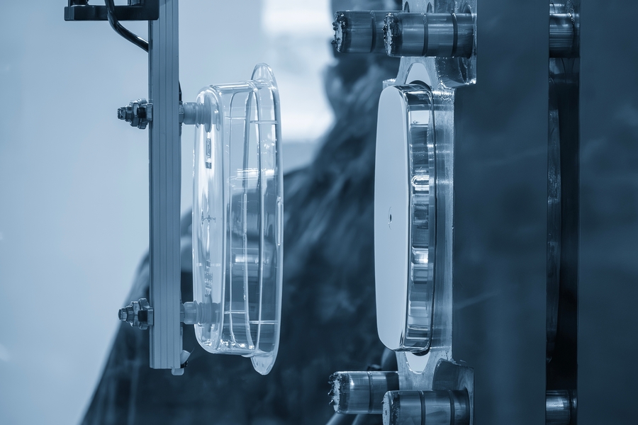 The,food,container,production,process,by,plastic,injection,mold.,close